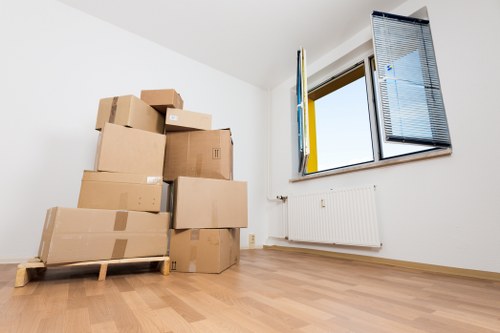 Expert movers packing and handling equipment with care