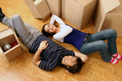 Organized moving truck interior with sorted boxes in Putney